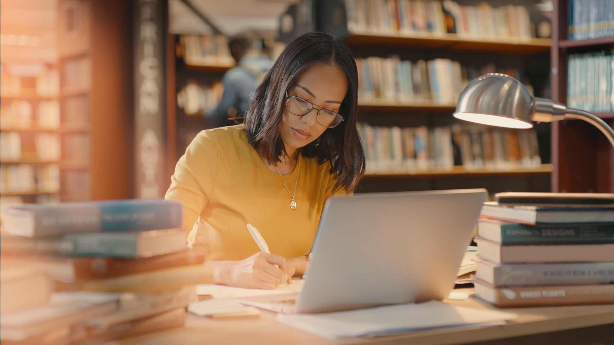 Student at computer in library